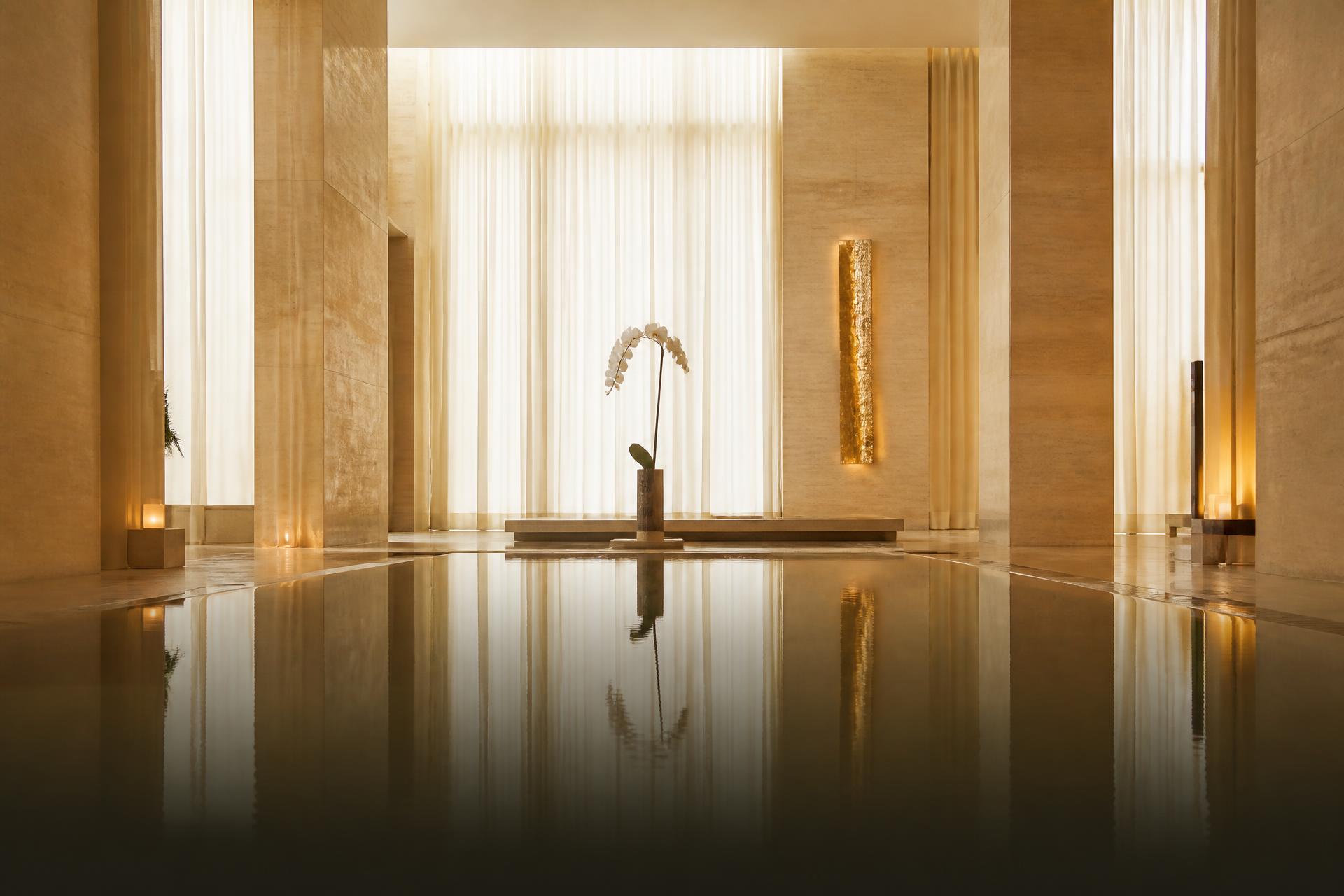 Serene light-filled sanctuary with a still reflecting pool